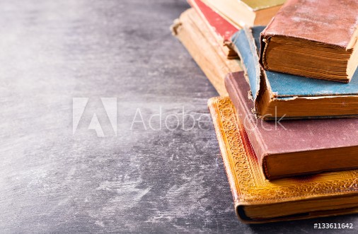 Picture of Old books on a dark table